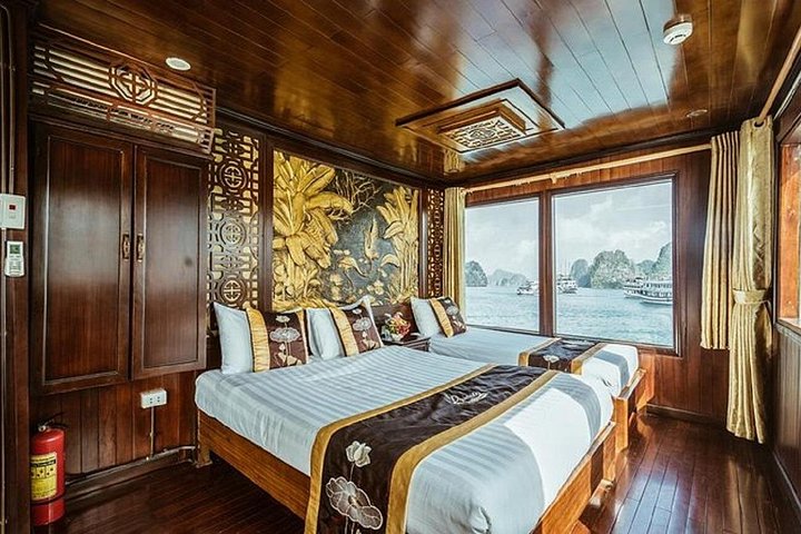 Luxury cruise navigating through the stunning limestone karsts of Ha Long Bay, Vietnam, photo 20 | wizardtrip