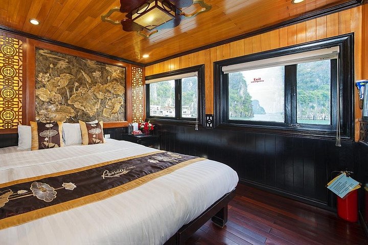 Luxury cruise navigating through the stunning limestone karsts of Ha Long Bay, Vietnam, photo 22 | wizardtrip