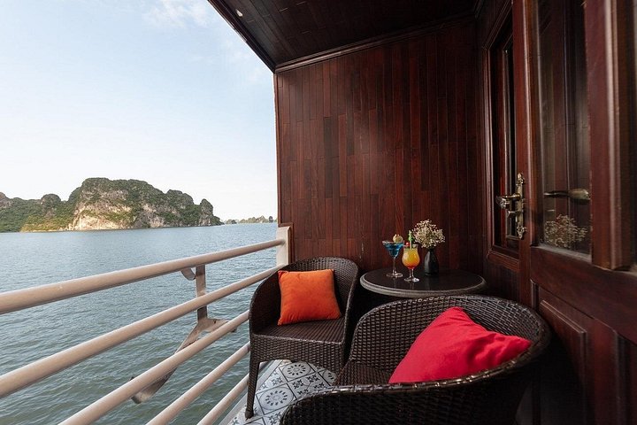 Luxury cruise navigating through the stunning limestone karsts of Ha Long Bay, Vietnam, photo 25 | wizardtrip