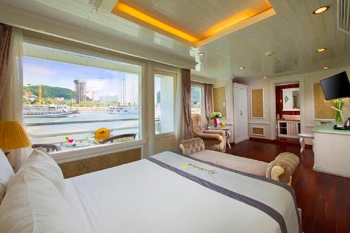 Luxury cruise navigating through the stunning limestone karsts of Ha Long Bay, Vietnam, photo 28 | wizardtrip