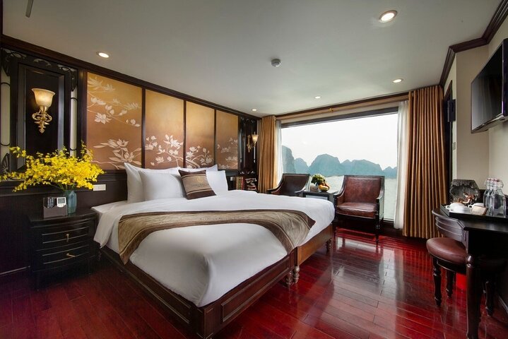 Luxury cruise navigating through the stunning limestone karsts of Ha Long Bay, Vietnam, photo 33 | wizardtrip