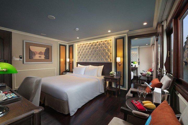 Luxury cruise navigating through the stunning limestone karsts of Ha Long Bay, Vietnam, photo 35 | wizardtrip