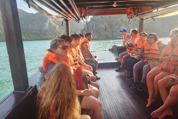 Luxury cruise navigating through the stunning limestone karsts of Ha Long Bay, Vietnam, photo 37 | wizardtrip