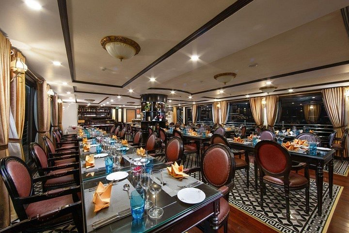 Luxury cruise navigating through the stunning limestone karsts of Ha Long Bay, Vietnam, photo 38 | wizardtrip