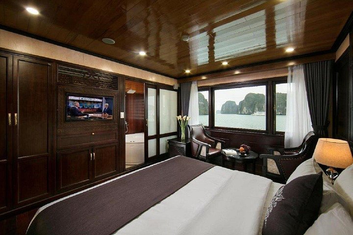 Luxury cruise navigating through the stunning limestone karsts of Ha Long Bay, Vietnam, photo 44 | wizardtrip