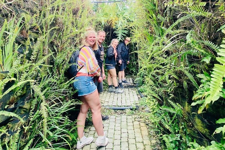 Tourists exploring the iconic Golden Bridge at Ba Na Hills, Vietnam, with its unique hand-shaped supports, photo 15 | wizardtrip