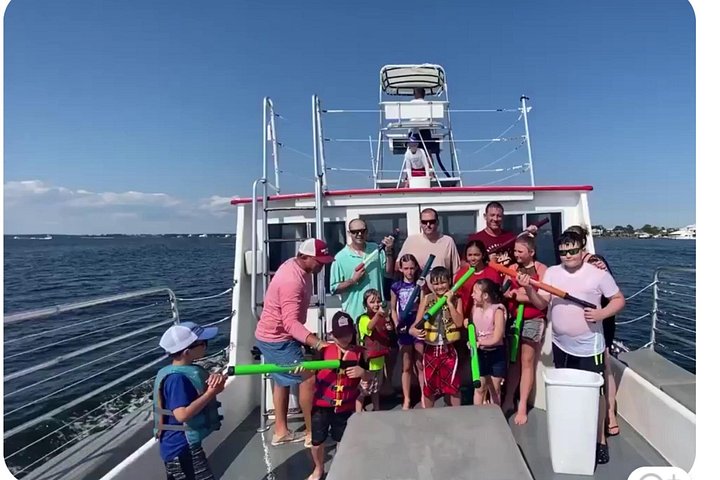 Nyt et morsomt delfinkryss og sjølivsopplevelse på en båt i Orange Beach, Alabama, foto 14 | wizardtrip