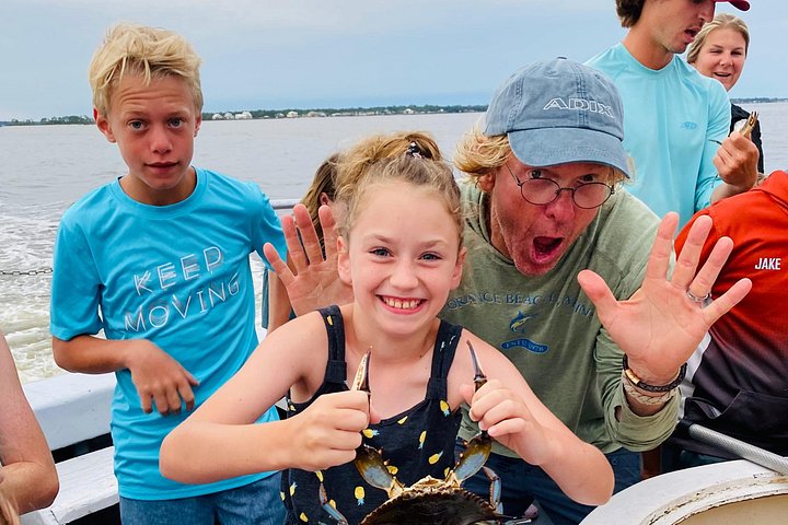 Nyt et morsomt delfinkryss og sjølivsopplevelse på en båt i Orange Beach, Alabama, foto 23 | wizardtrip