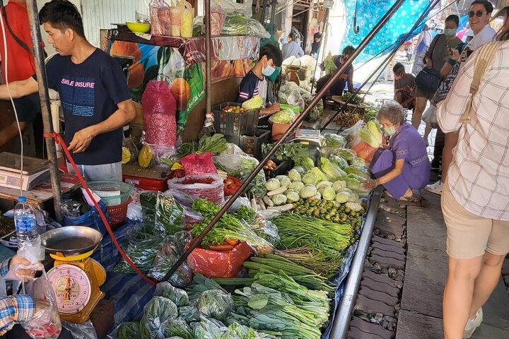 Experience Thailand's vibrant floating markets and unique train market, photo 9 | wizardtrip