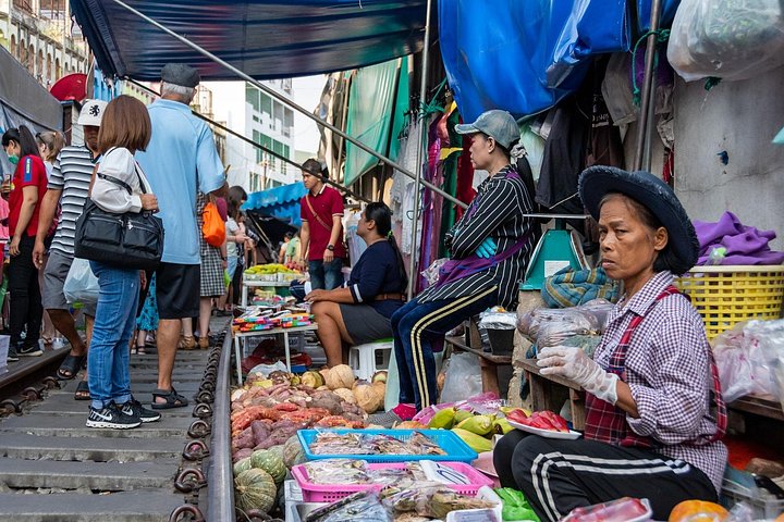Experience Thailand's vibrant floating markets and unique train market, photo 11 | wizardtrip