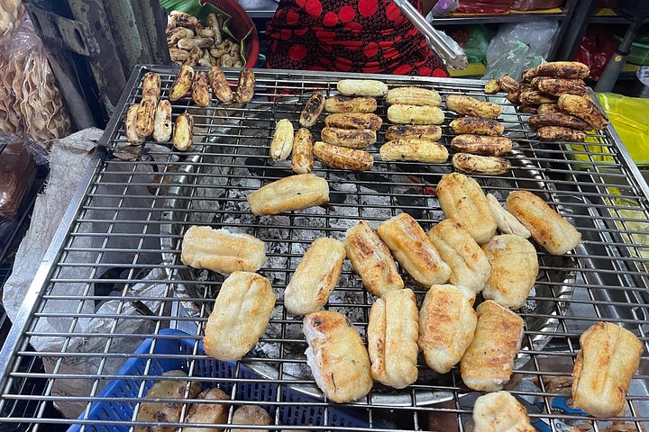 Tour de comida callejera en moto en Ciudad Ho Chi Minh, Vietnam, con platos locales y conductores, foto 27 | wizardtrip