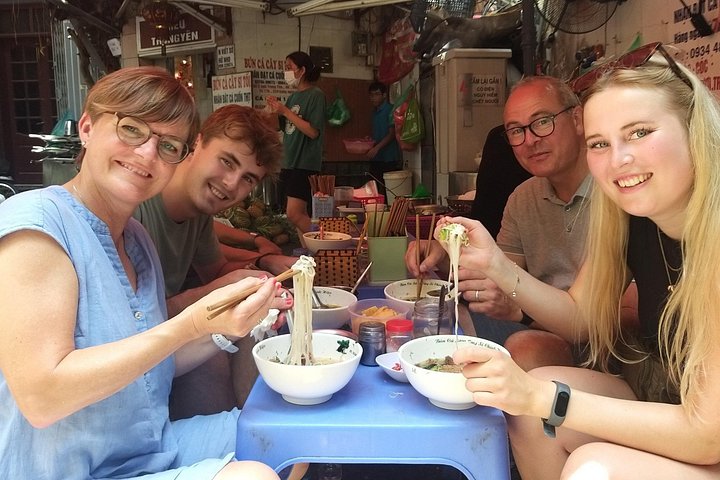 A guided street food tour in Hanoi's Old Quarter, sampling local delicacies and experiencing Vietnamese culture, photo 19 | wizardtrip