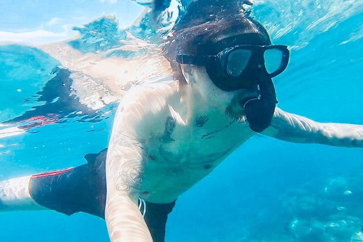 Aventura de snorkel en la playa Blue Lagoon de Bali, explorando arrecifes de coral y vida marina, foto 26 | wizardtrip