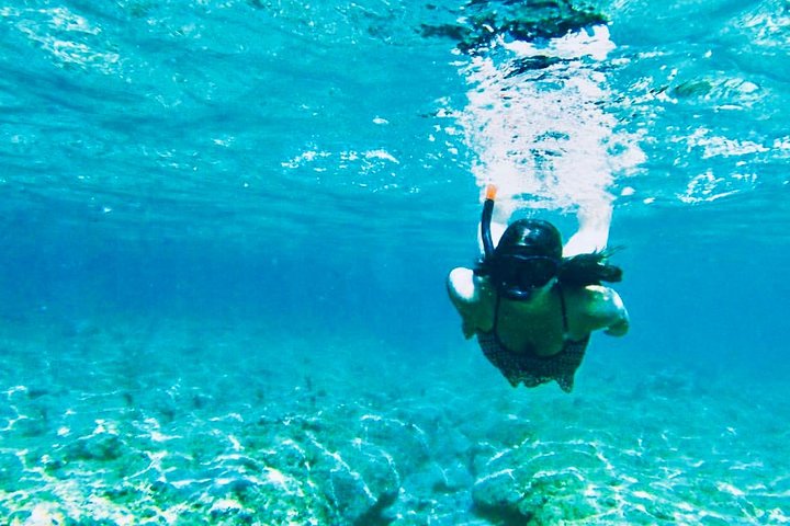 Aventura de snorkel en la playa Blue Lagoon de Bali, explorando arrecifes de coral y vida marina, foto 29 | wizardtrip