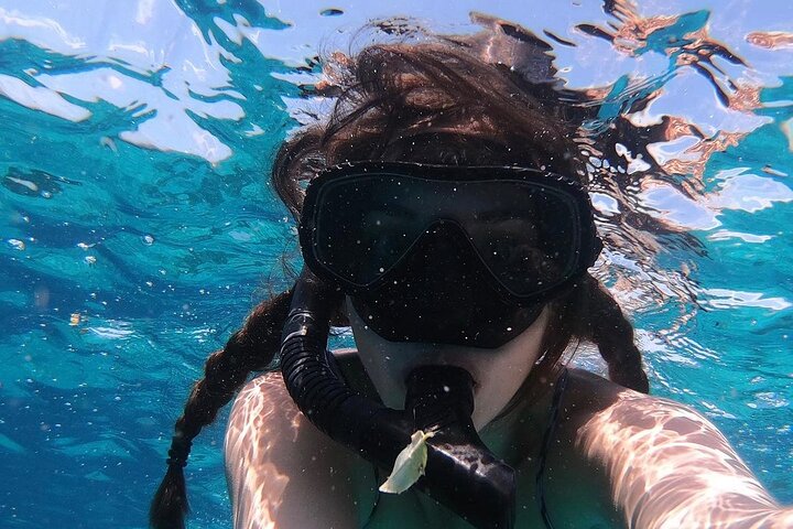 Aventura de snorkel en la playa Blue Lagoon de Bali, explorando arrecifes de coral y vida marina, foto 44 | wizardtrip