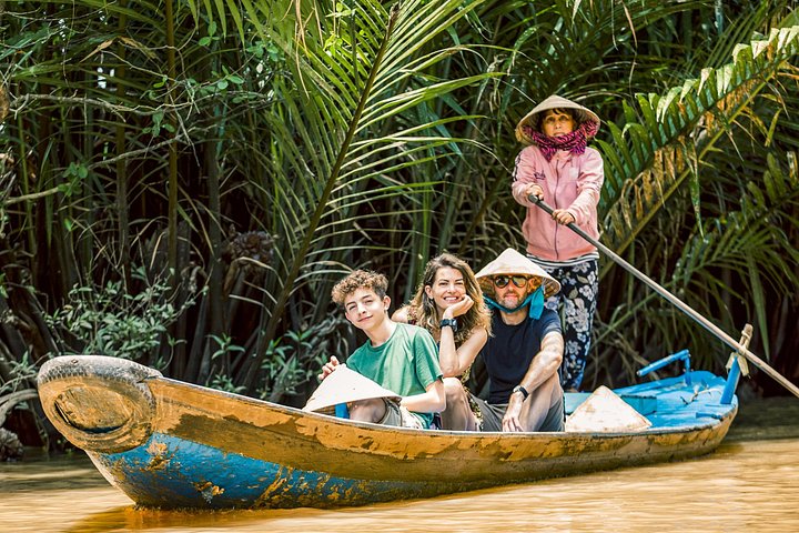 A scenic boat tour through the lush Mekong Delta canals, showcasing local life and tropical landscapes, photo 16 | wizardtrip