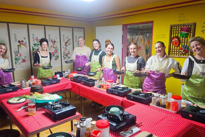 Korean cooking class and market tour in a local Seoul home, featuring traditional dishes and fresh ingredients, photo 13 | wizardtrip