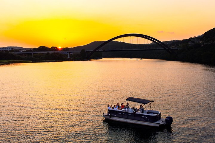 Scenic 1-hour sunset boat cruise on Lake Austin, passing landmarks like Mount Bonnell and Pennybacker Bridge, photo 6 | wizardtrip