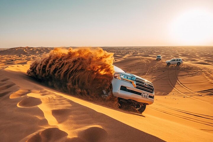 Morning Red Dunes Safari: Camel Ride & Sandboarding Adventure | wizardtrip