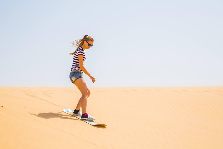 Experience a thrilling morning desert safari in Dubai with dune bashing, sandboarding, and camel rides, photo 6 | wizardtrip