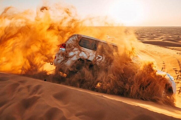 Experience a thrilling morning desert safari in Dubai with dune bashing, sandboarding, and camel rides, photo 12 | wizardtrip