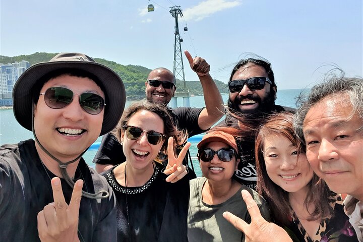 Tour pelos destaques de Busan com paisagens costeiras, vilas culturais e mercados, foto 8 | wizardtrip