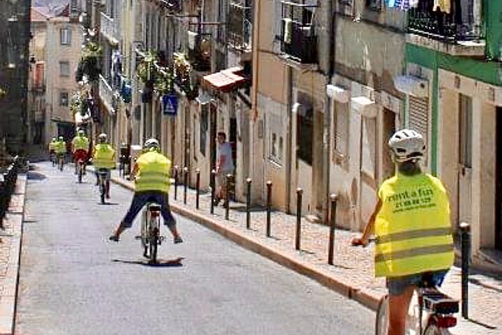 Passeio de bicicleta elétrica pelas colinas históricas e miradouros de Lisboa, foto 8 | wizardtrip