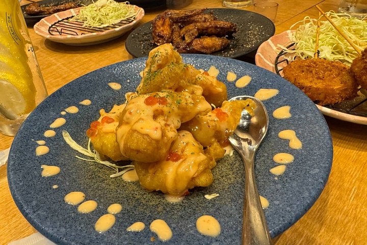 Tour gastronomico di Osaka con piatti e bevande locali nel quartiere di Shinsekai, foto 8 | wizardtrip