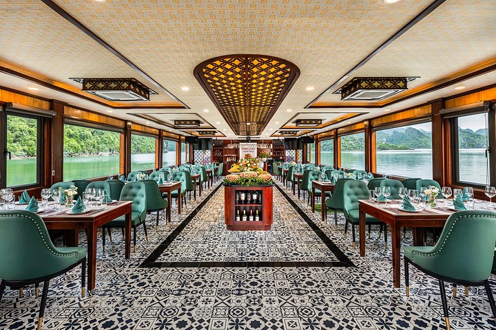 Luxurious 5-star cruise navigating through the stunning limestone karsts of Halong Bay, Vietnam, photo 6 | wizardtrip