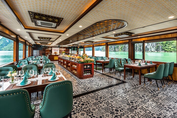 Luxurious 5-star cruise navigating through the stunning limestone karsts of Halong Bay, Vietnam, photo 7 | wizardtrip