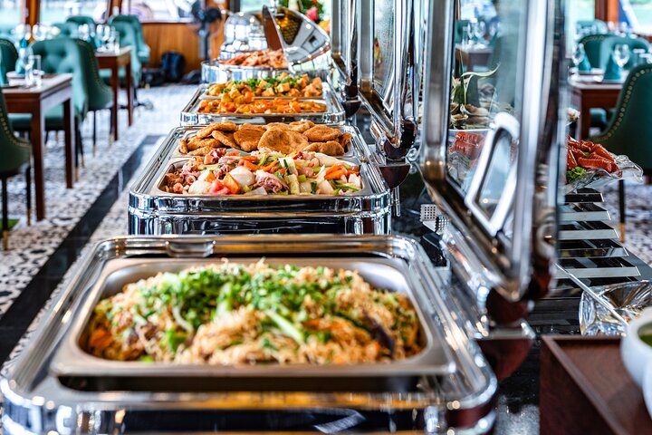 Luxurious 5-star cruise navigating through the stunning limestone karsts of Halong Bay, Vietnam, photo 14 | wizardtrip
