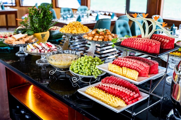 Luxurious 5-star cruise navigating through the stunning limestone karsts of Halong Bay, Vietnam, photo 16 | wizardtrip