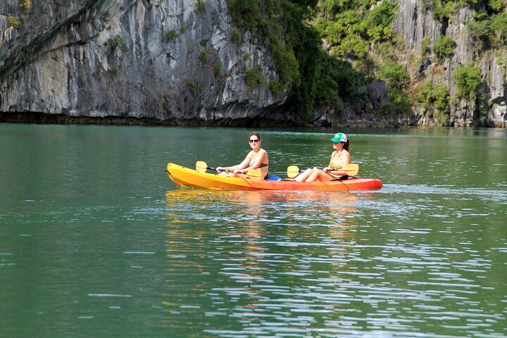 Luxurious 5-star cruise navigating through the stunning limestone karsts of Halong Bay, Vietnam, photo 32 | wizardtrip