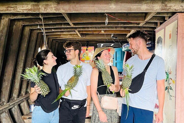 Verken de levendige Mekong Delta met een boottocht over de Cai Rang drijvende markt en lokale dorpen in Can Tho, foto 7 | wizardtrip