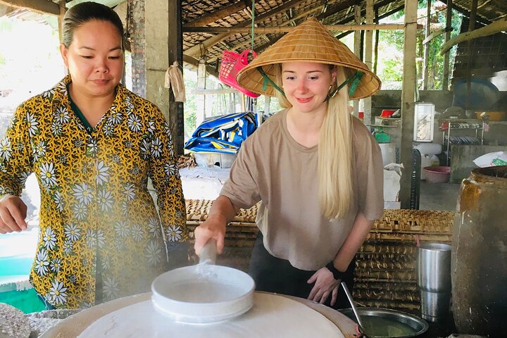 Verken de levendige Mekong Delta met een boottocht over de Cai Rang drijvende markt en lokale dorpen in Can Tho, foto 11 | wizardtrip