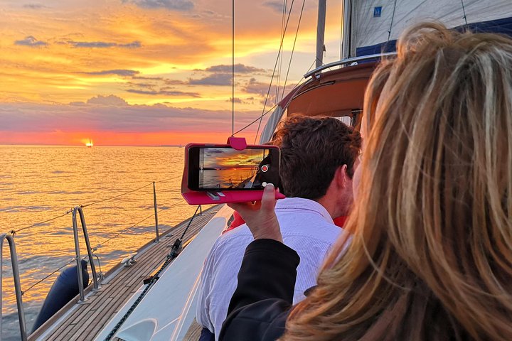 Lisbon Sunset Sailing Tour on Luxury Sailing Yacht with 2 Drinks | wizardtrip