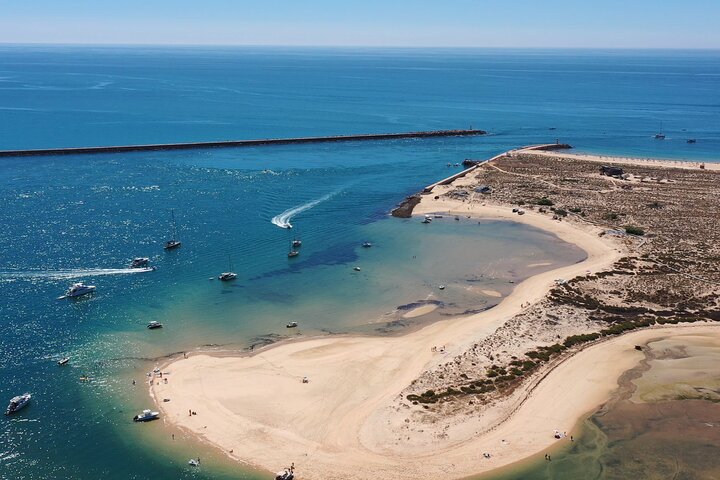 Excursion en bateau dans le parc naturel de Ria Formosa à Faro, Portugal, visitant ses magnifiques îles, photo 8 | wizardtrip