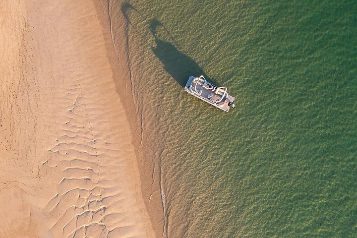 Excursion en bateau dans le parc naturel de Ria Formosa à Faro, Portugal, visitant ses magnifiques îles, photo 28 | wizardtrip