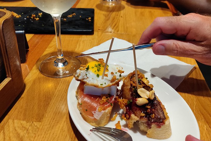 Explore Bilbao's culinary scene with a local guide, tasting pintxos and wine at authentic bars, photo 17 | wizardtrip