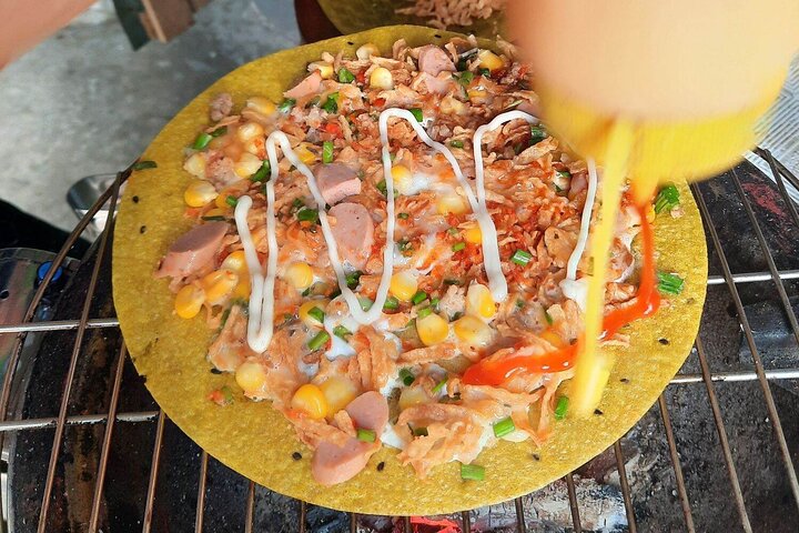 Découvrez la cuisine de rue authentique de Ho Chi Minh-Ville lors d'un tour guidé en moto, en dégustant des spécialités locales, photo 10 | wizardtrip