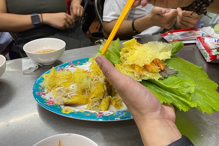 Découvrez la cuisine de rue authentique de Ho Chi Minh-Ville lors d'un tour guidé en moto, en dégustant des spécialités locales, photo 25 | wizardtrip