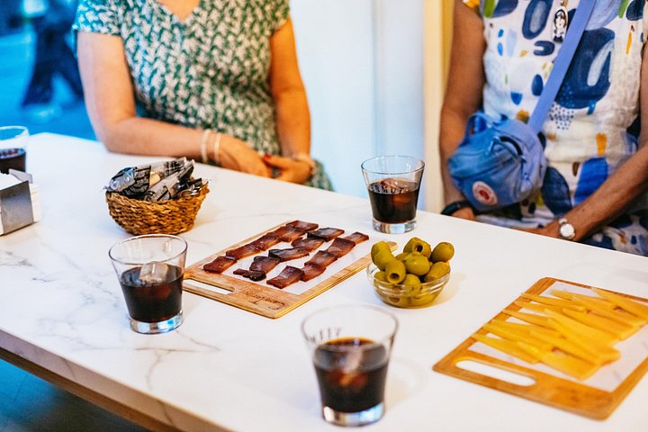 Enjoy authentic tapas and local drinks on a guided food tour through Seville's charming neighborhoods, photo 15 | wizardtrip