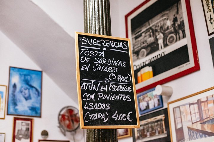 Enjoy authentic tapas and local drinks on a guided food tour through Seville's charming neighborhoods, photo 18 | wizardtrip