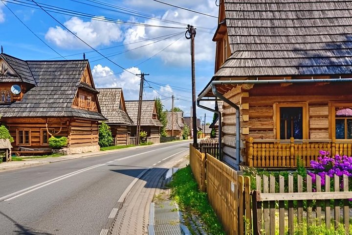 Naturskøn udsigt over Zakopane, Tatra-bjergene og traditionel polsk arkitektur, foto 12 | wizardtrip