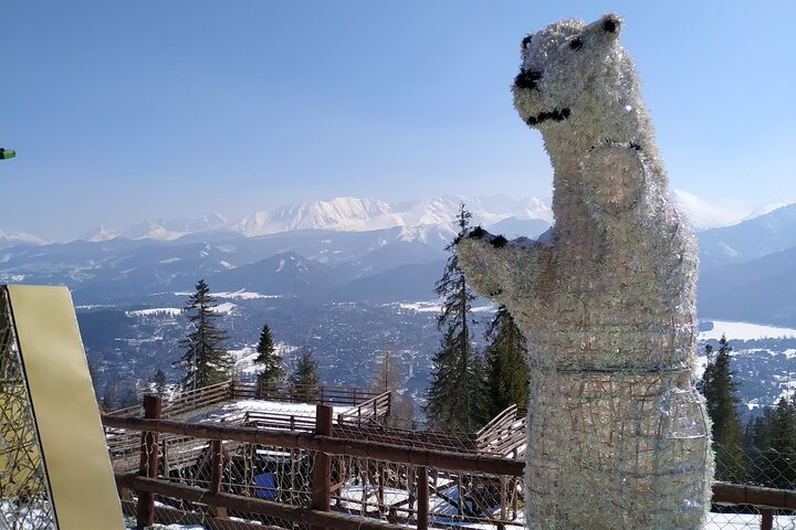 Naturskøn udsigt over Zakopane, Tatra-bjergene og traditionel polsk arkitektur, foto 19 | wizardtrip
