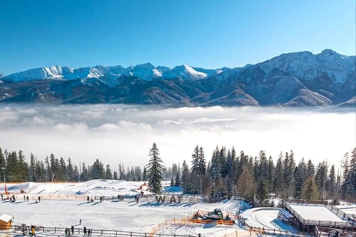 Naturskøn udsigt over Zakopane, Tatra-bjergene og traditionel polsk arkitektur, foto 21 | wizardtrip