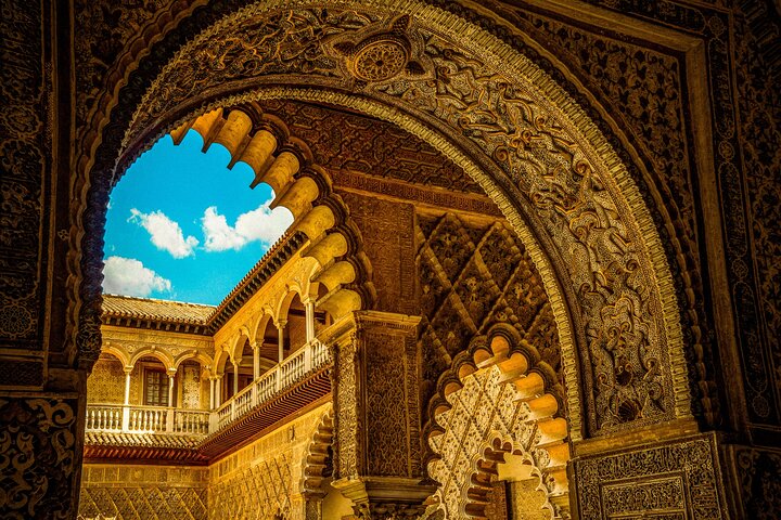 Guided tour of Seville's Alcázar, Cathedral, and Giralda Tower, showcasing historical architecture and city views, photo 10 | wizardtrip