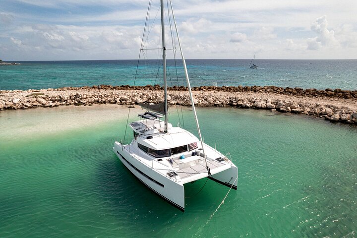 Luxury private catamaran sailing trip in Tulum with open bar and snorkeling, photo 7 | wizardtrip