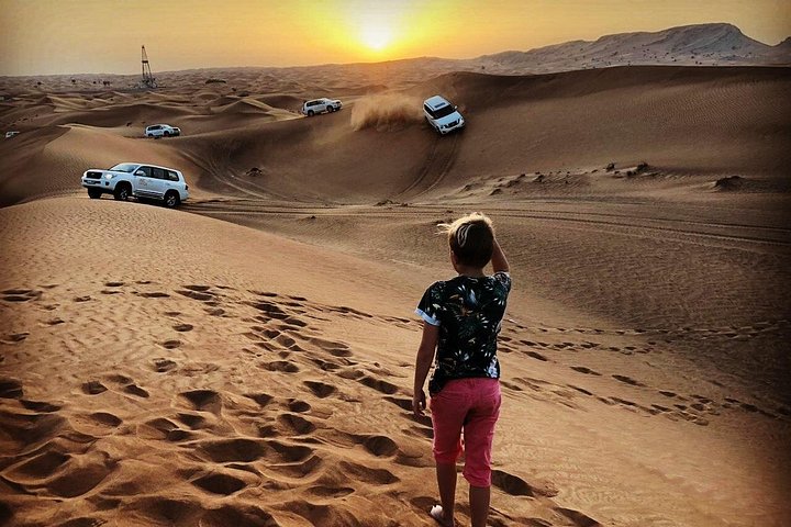 Experience a thrilling desert safari in Dubai with dune bashing, quad biking, camel rides, and a BBQ dinner under the stars, photo 6 | wizardtrip