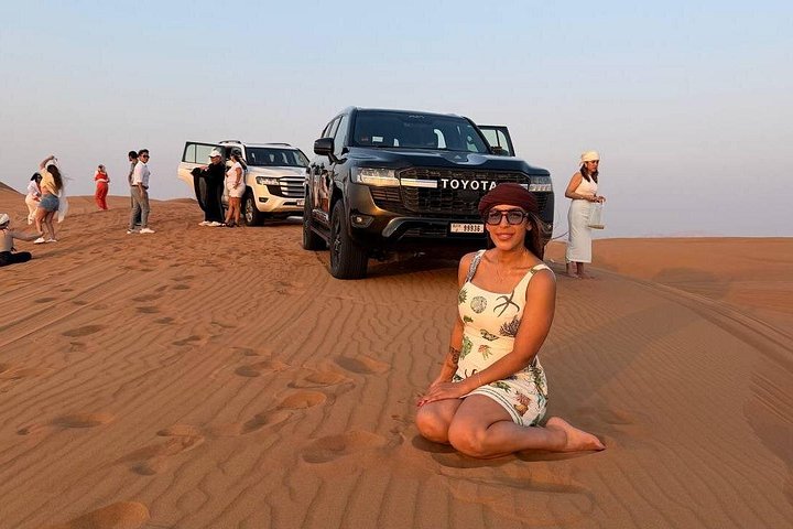 Experience a thrilling desert safari in Dubai with dune bashing, quad biking, camel rides, and a BBQ dinner under the stars, photo 7 | wizardtrip